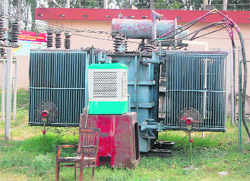 To keep the temperature of power transformers low, authorities have put up a cooler and fans in front of one of them 