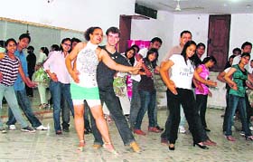 Alex and Dr Sangita B. Khushwaha give tips to the budding salsa dancers in Ludhiana