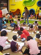 Children participate in a painting competition organised by Reliance Time Out at Ambiance Mall in Gurgaon. 