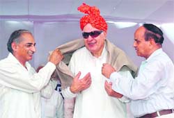 The Union Minister for New and Renewable Energy, Dr Farooq Abdullah, is honoured at the annual day function of the Mirpur Institute of Medical Sciences in Rewari