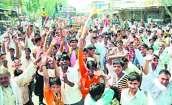 Villagers block the Karnal-Meerut road in protest against power cuts in Karnal 