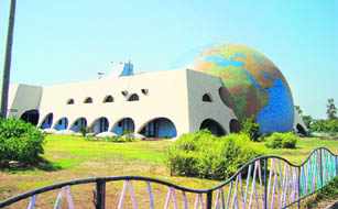 The dome is covered with 25 lakh computer-designed tiles of one square inch each, and looks like a giant globe. The earth-shaped dome has become the iconic symbol of the PGSC