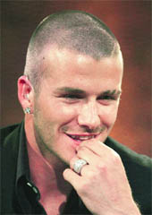 The tattoo on David Beckhams left forearm misspells Victoria with an added h- as in Vihctoria 