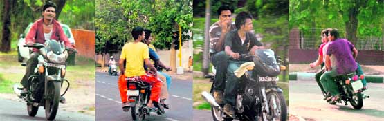 Youths giving two hoots to the traffic rules in Chandigarh on Sunday.