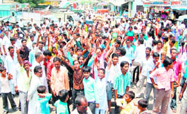 Residents of Jwalapur in Haridwar stage a protest over contaminated water supply. 