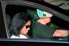 Rebbi Jackson (left), sister of the late pop star Michael Jackson, leaves the Jackson family home in Encino, in the greater Los Angeles area, California, on Saturday.