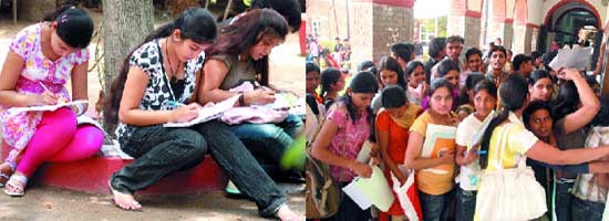 Girls fill in admission forms at Kirori Mal College in north campus. Students queue up to submit their forms at Arts Faculty in New Delhi on Monday.