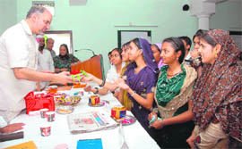 Dr S Farooq, chairman, Educational and Social Welfare Society, gives awards to the participants.