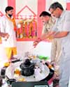 Sirsa SHO Ajay Sharma performs puja in a temple set up in the city police station to invoke Lord Shiva for rains on Monday.