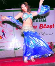 A Russian dancer gives a performance at a musical event at Badkhal Lake in Faridabad on Sunday night.