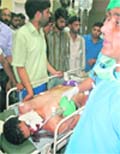 A youth injured in the Baramulla clashes is treated at a Srinagar hospital 