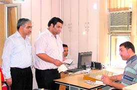 Naib tesildar JS Tiwana at work at the sub-registrar’s office in Ludhiana on Monday.