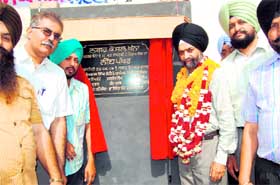 Iqubal Singh, president of the municipal council, inaugurates a development project in Khanna on Monday.
