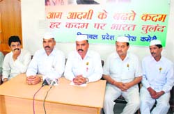 Himachal Pradesh Congress Sewa Dal in charge Sushil Prasher with other members of the organisation addressing a press conference at Shimla