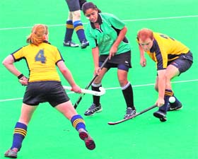Players of Chandigarh Hockey Academy and Imperial College Club, United Kingdom, in action during a friendly match in Chandigarh