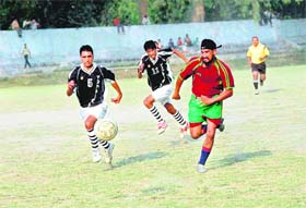 Players in action at the District Football League in Dehradun