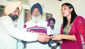 NRI Gurinder Singh being honoured in Patiala on Thursday.