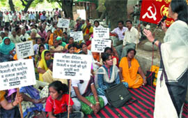 CPI Politburo member Brinda Karat addresses a gathering during a dharna against shortage of water and power cuts at ITO in New Delhi on Thursday.