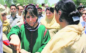 The police stops PDP president Mehbooba Mufti and other party leaders at Parimpora, near Srinagar