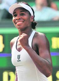 Venus Williams jubilates after winning against Dinara Safina during their semifinal