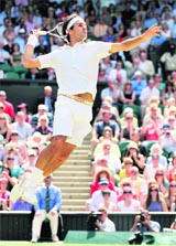 Roger Federer plays a shot during his semifinal against Tommy Haas on Friday.