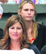 Face Value: Roger Federers wife Mirka Vavrenic (L) and US actress and Tommy Haasgirlfriend Sara Foster watch their match at Wimbledon on Friday. 