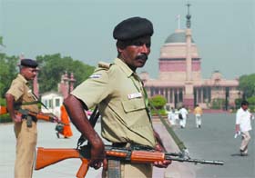 Security personnel keep a vigil during the Budget session at at Parliament in New Delhi