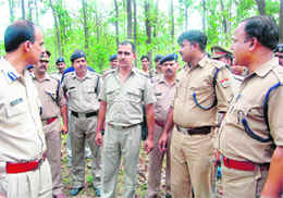 IG MA Ganapathy and other officials at the encounter site.
