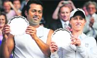 Leander Paes and Cara Black with their trophies