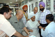 A woman being checked during the blood investigation camp organised in Amritsar.