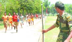 Youths appear for the fitness test during the recruitment rally of the Territorial Army at Dogra grounds in Jalandhar cantonment