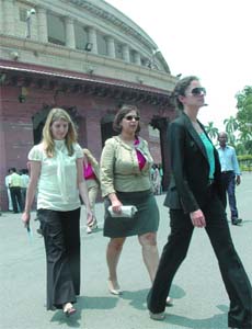 Foreign visitors come out of the Parliament House after watching the proceedings in New Delhi