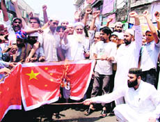 Muslims protest against the Chinese government in Ludhiana on Wednesday.