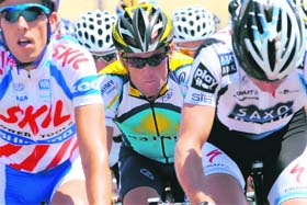 Team Astanas rider Lance Armstrong rides in the pack