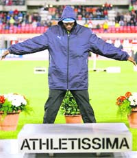 Usain Bolt celebrates before the prize-giving ceremony in Lausanne