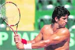 Fernando Verdasco of Spain returns a ball during a training session, ahead of their 