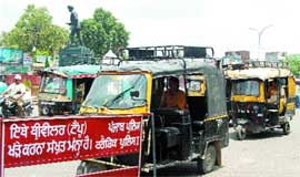Inspite of a no-parking sign, a number of auto-rickshaws stand parked outside the Hall Gate area even as the traffic police turns a blind eye to the violation