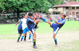 A match in progress at the District Football League in Dehradun on Friday.