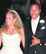 Brazilian soccer star Robinho gestures during his wedding in Guaruja on Thursday.