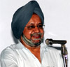 Dr G.P.I. Singh speaks at the meeting on Saturday.