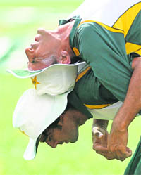 Pakistans Abdur Rauf (bottom) carries captain Younis Khan on his back during a practice session ahead of their second Test cricket match against Sri Lanka in Colombo, on Saturday.