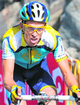 Kazakh cycling team Astanas leader Alberto Contador of Spain breaks away on Friday in the seventh stage.