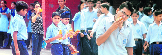 Students beat the heat with cold drinks in GMSSS, Sector 10, in Chandigarh, and (right) A boy having a burger at GMSSS, Sector 10, in Chandigarh.