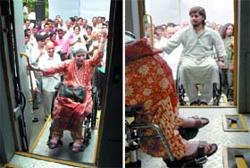 WE CARE: A disabled lecturer makes way in the specially-designed bus at North Campas in New Delhi