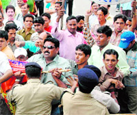 Shiksha acharyas protest in front of the state Assembly on Monday.