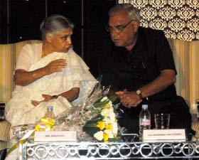Delhi Chief Minister Sheila Dikshit with her Haryana counterpart Bhupinder Singh Hooda in Gurgaon