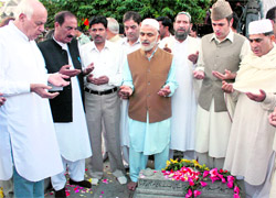 Farooq Abdullah and CM Omar offer prayers at Martyrs Graveyard to mark Martyrs Day.