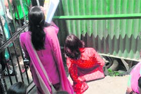 A closed gate is no barrier for these students of RKMV, Shimla, to come out of the campus