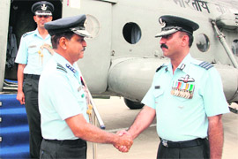 Air Marshal NAK Browne (left), Air Officer Commanding-in-Chief of  the Western Air Command, is received by Group Captain Ghar Singh, station commander of Air Force station, Jammu, on Tuesday. 