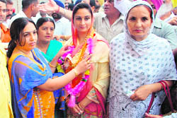 Harsimrat Kaur Badal, Bathinda MP, campaigns for her husband Sukhbir Badal at Jalalabad on Tuesday.